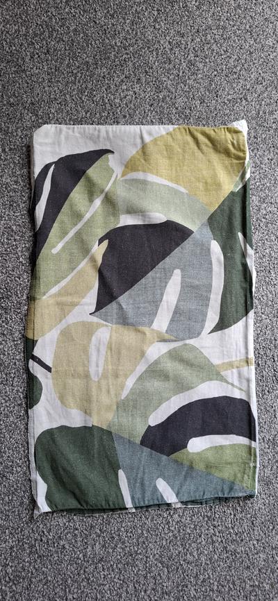 Hand-sewn massage chair cover in green leaf fabric