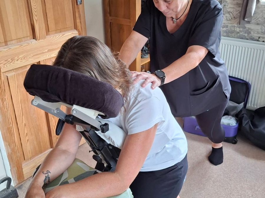 Seated Chair Massage in a client's living room