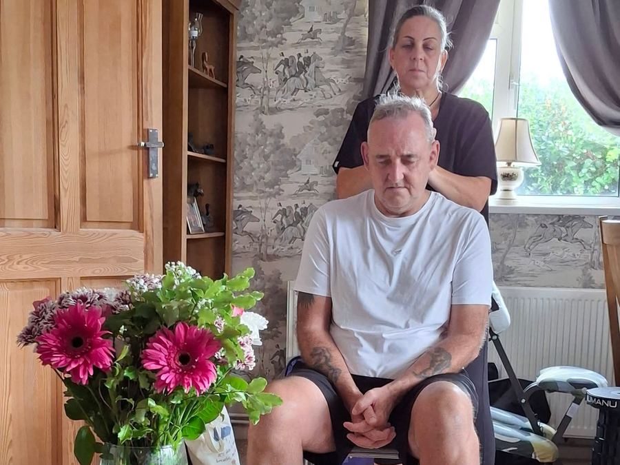A client relaxing in a chair at home after an Indian Head Massage